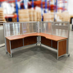 Load image into Gallery viewer, Mobile L-shaped workstation with surrounding semi-clear upper and coloured lower panels. Light brown worksurface and panels.
