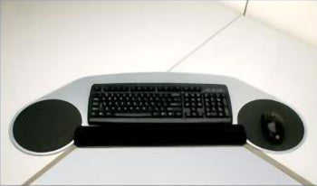 Slim profile corner creator with dual mouse surface and palm rest