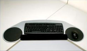 Slim profile corner creator with dual mouse surface and palm rest